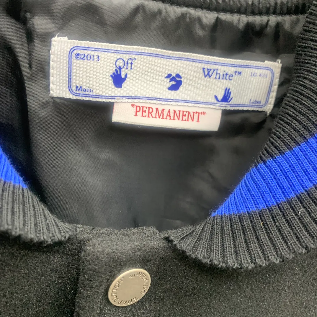 Top tested version 2023 off white heavy industry embroidery patchwork leather high temperature hot crystal diamond baseball uniform male and female couple star same style (⚠ original button mold customization, patch embroidery color matching) original packaging original label 🔍 full set of accessories customization packaging elevators are purchased from the original factory all hardware parts mold customization one-to-one restoration of fabric color components The fabric is made of 65% wool, 15% natural silk, 10% spandex and 10% velvet, mixed and custom-woven. The total weight is more than 900 grams! And the most important thing is its color fastness, it will never fade! -The embroidery uses an imported towel embroidery machine. Each pattern is first embroidered on the fabric, and then engraved with an infrared laser, and then fixed with a sewing machine. The whole garment is labeled in many places, one is flat embroidered, and the large pattern on the back is directly embroidered on it. This dress has 4 different embroidery techniques⚠ -The sleeves are all made of two-layer pebbled fabric, which is processed, shaped, colored, washed, and the texture retains the original grain structure! Thick, plump and round! -The processing technology is extremely complex, the cutting pieces are neatly aligned, and the entire garment has precise wiring density. Gender-neutral style. Loose fit, self-conscious quality control, details determine success or failure. Color: Black Size: S M L XL P: 680